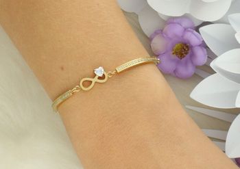 Złota bransoletka Nomination Italy Milleluci z symbolem nieskończoności i sercem z kryształka. Stal szlachetna, cyrkonie, regulowana długość 14–19 cm. Idealna na prezent! (2).jpg